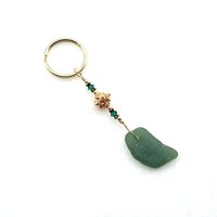 gold Bali green crystal accents