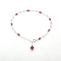 Eight tiny faceted crystal beads 