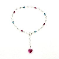 this ankle bracelet has an adjustable sterling silver chain