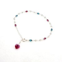wire wrapped together by hand with sterling silver wire