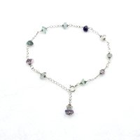 wire wrapped together by hand with sterling silver wire 