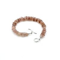with a sterling silver curved design toggle clasp