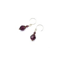 These earrings are handmade with beautiful faceted crystal beads in a dark purple amethyst color. 