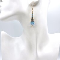 2.5 inches (6.4cm) in length from the top of the ear wires