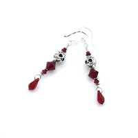 2 3/4" - 7cm in length from the top of the sterling silver pierced earwires