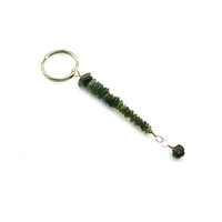 4 inches in length including the gold tone keyring