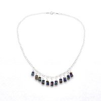 silver chain with beaded fringe design