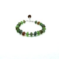 in shades of green, teal and brown