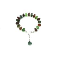 with a sterling silver chain and teal sea glass dangle 