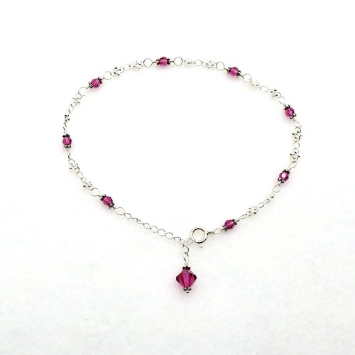 Eight tiny faceted crystal beads 