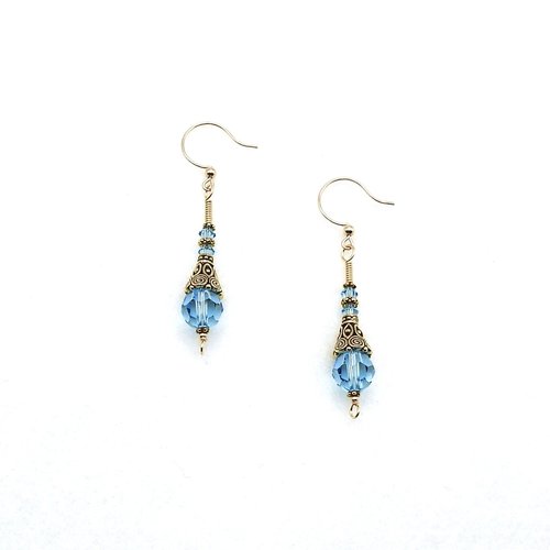 long dangle light blue aquamarine color crystal beads and ornate gold plated cones