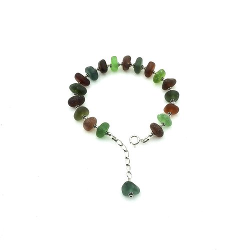 with a sterling silver chain and teal sea glass dangle 