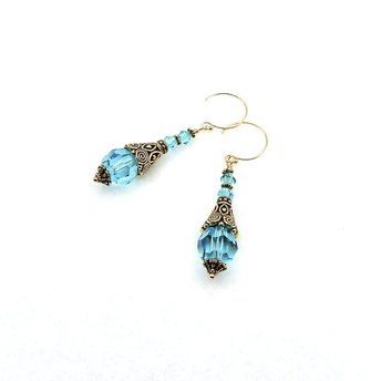 Long light turquoise blue crystal earrings measuring 2 inches in length from the top of the ear wires