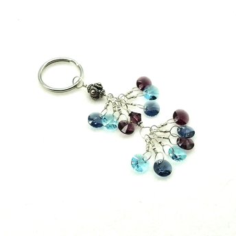 a handmade keychain with clusters of crystal beads