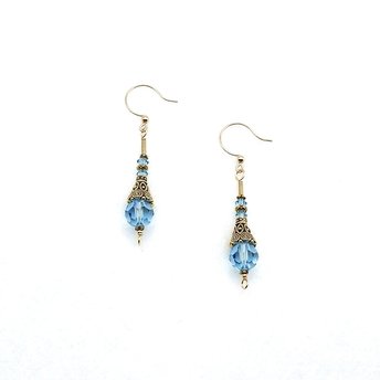 long dangle light blue aquamarine color crystal beads and ornate gold plated cones